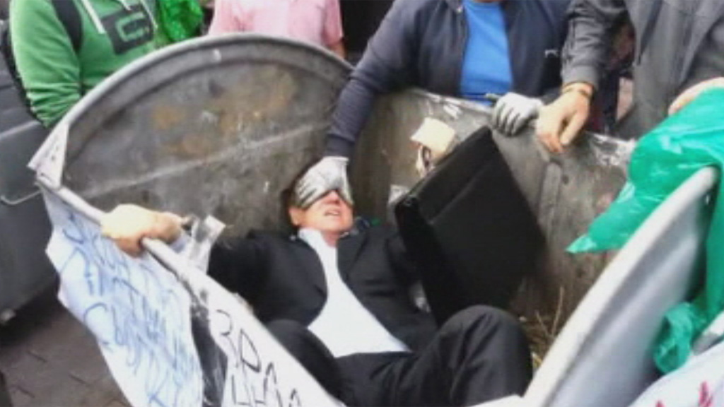 Ukraine politician thrown into waste bin Channel 4 News