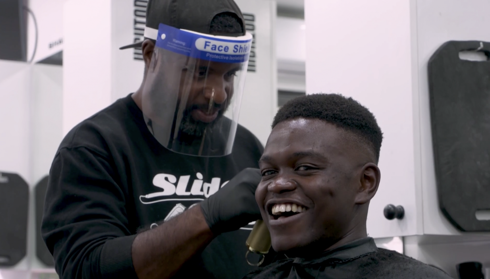 Inside an east London barber shop after eased lockdown restrictions