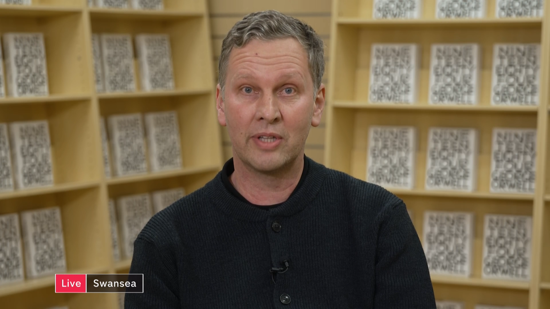 Artist David Shrigley turns 6000 unwanted Da Vinci Code books into George Orwell's 1984 – Channel 4 News - Vimarsana News