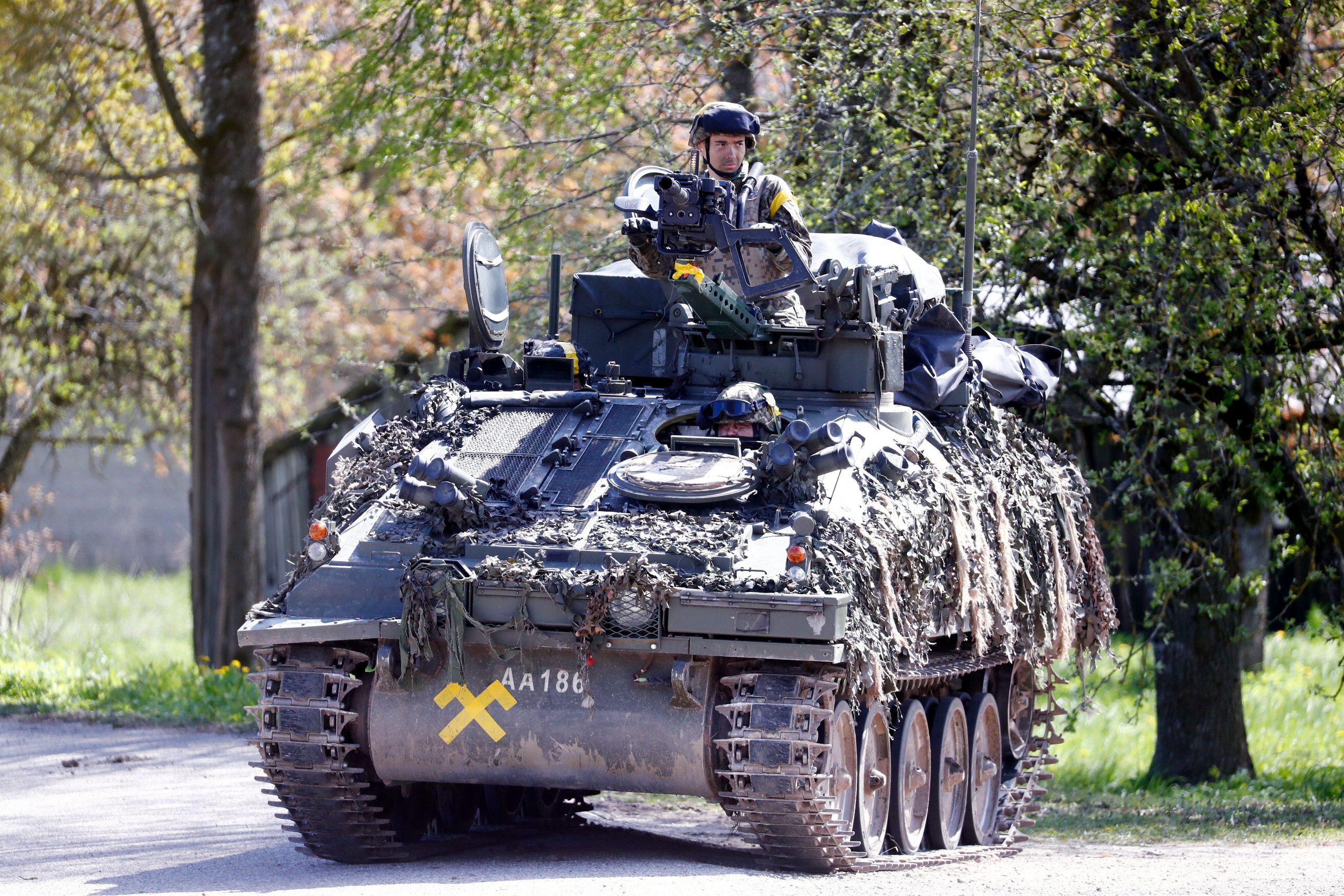 A British Army armoured personnel carrier takes part in the military exercise 'Crystal Arrow 2025' in Sigulda county, Latvia