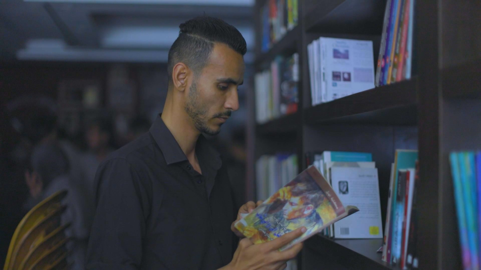 The man who rescues books from rubble: Omar Hamad opens Phoenix library in Gaza