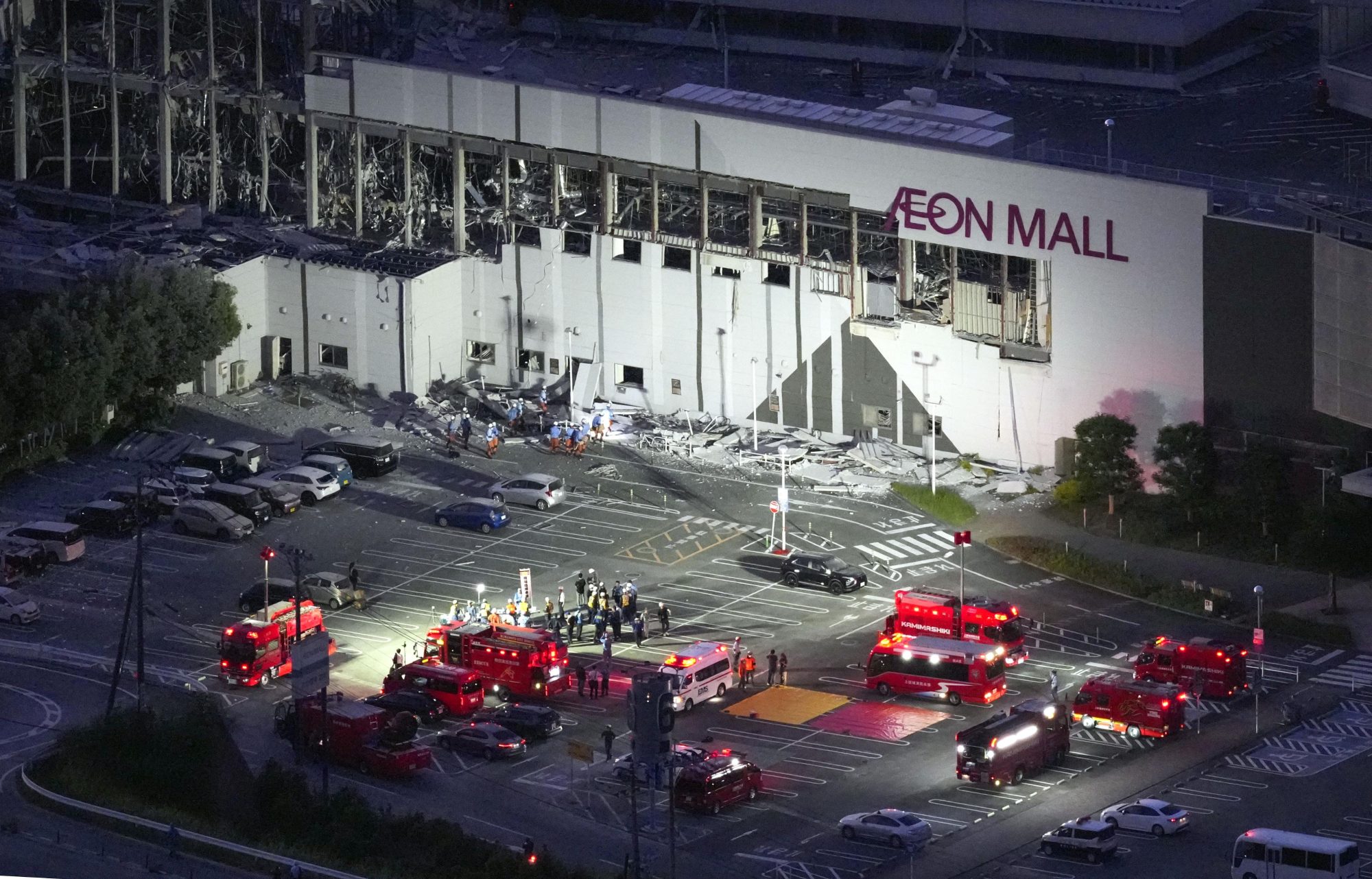 Japan earthquake – race to rescue workers trapped in collapsed shopping centre